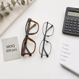 private label eyewear MOQ explained — acetate and metal frames with minimum order quantity checklist flat lay