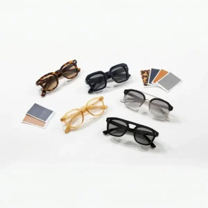 custom color acetate sunglasses — five colorways including tortoiseshell gradient transparent and solid beside acetate sheet color samples