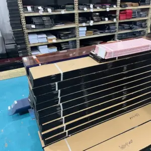 Stacked acetate sheets of varying thickness and color in Sailook's raw material warehouse, ready for CNC cutting into sunglasses frames