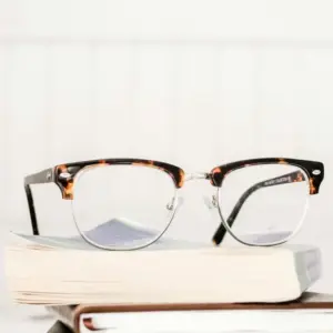 Tortoiseshell acetate browline reading glasses with silver hardware, styled as a fashion-forward alternative to basic pharmacy readers