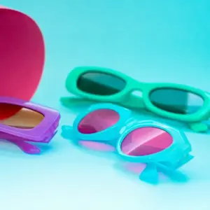 Three injection-molded sunglasses in purple, green, and teal with mirrored lenses and a pink case, showing colorway variety